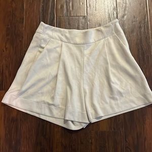 Beige suede pleated shorts